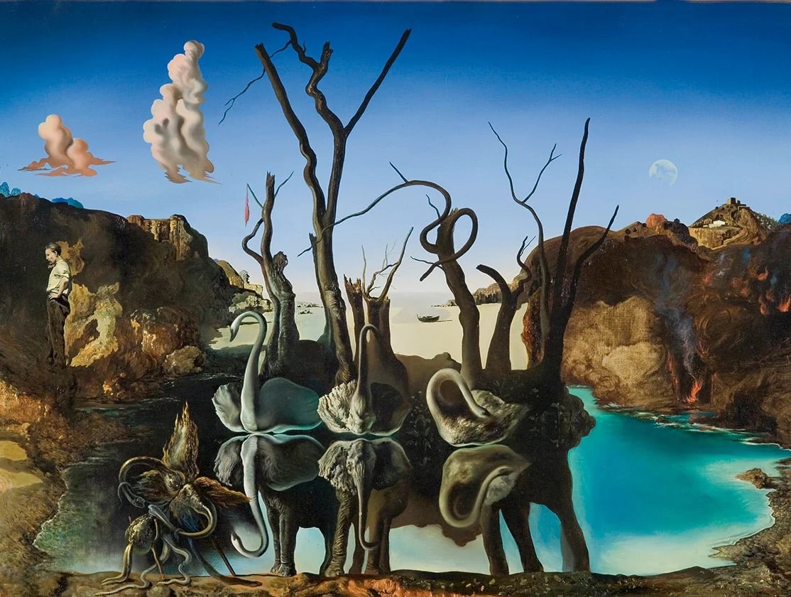 Dalí's Swans Reflecting Elephants: three swans on a still lake among bare trees, whose reflections in the water form three elephants