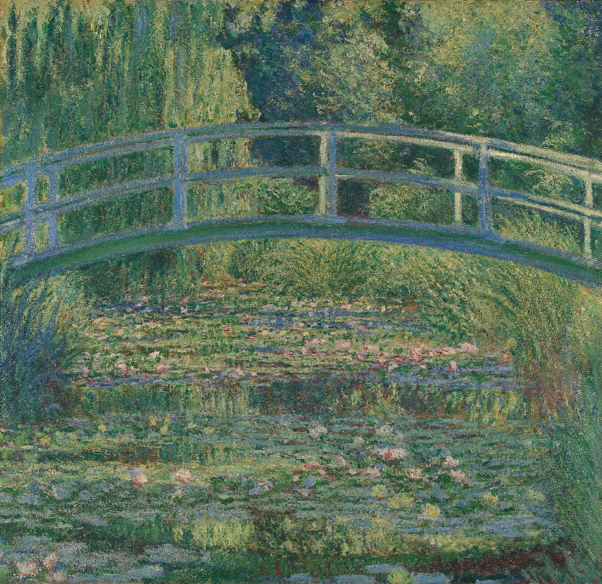 Monet's water-lily pond at Giverny, with the arched Japanese footbridge, willows and floating water lilies