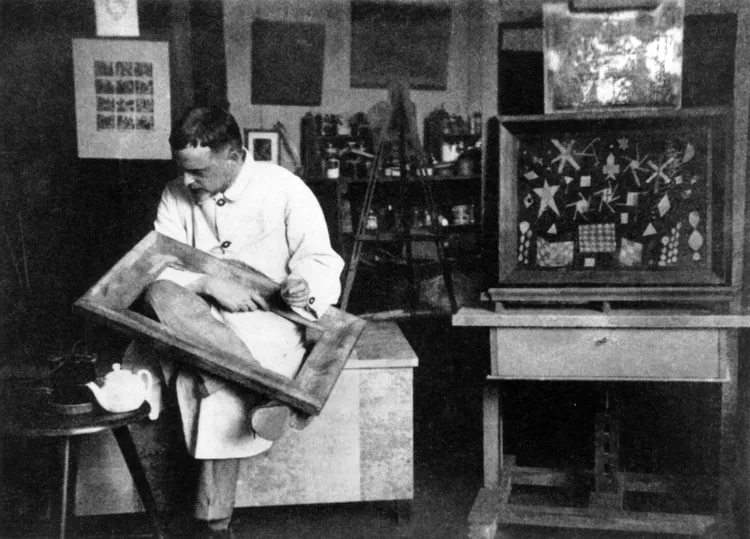 Paul Klee in his studio, Weimar, 1924