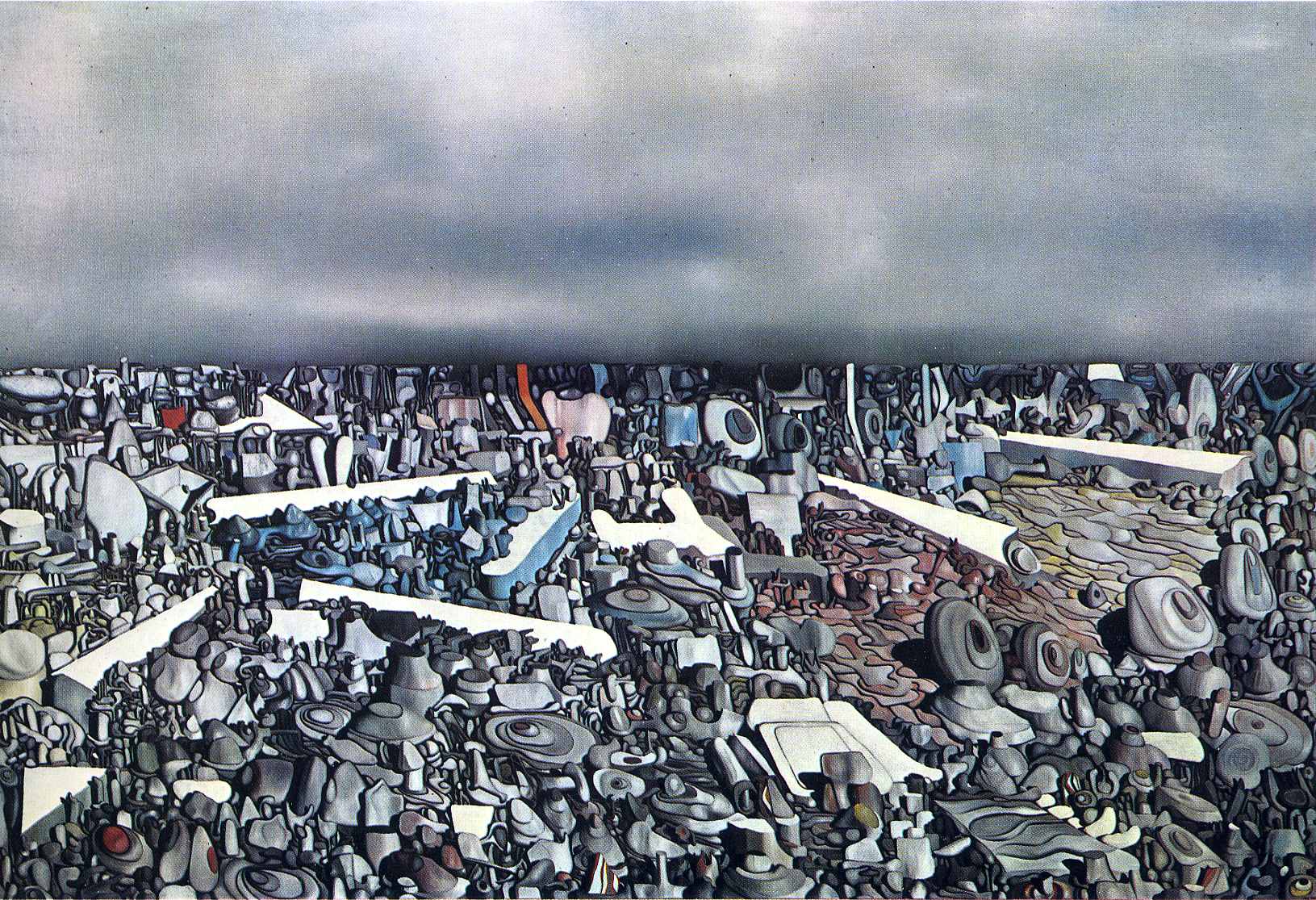 Tanguy's Multiplication of the Arcs: a vast field of countless stones, bones and fragments stretching into the distance under a pale grey sky