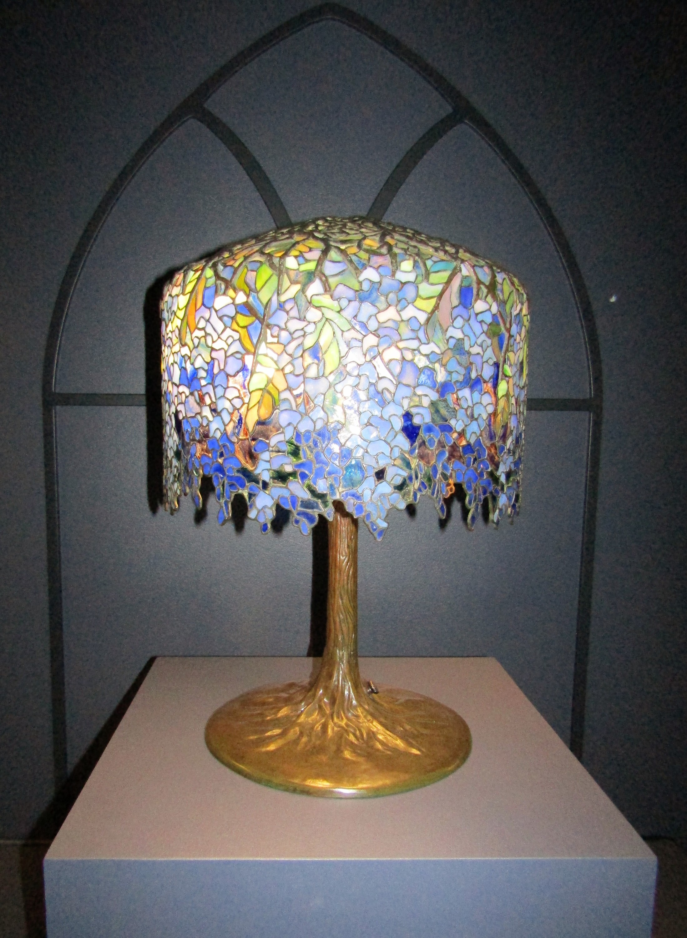 A Tiffany Studios wisteria lamp, leaded glass and bronze