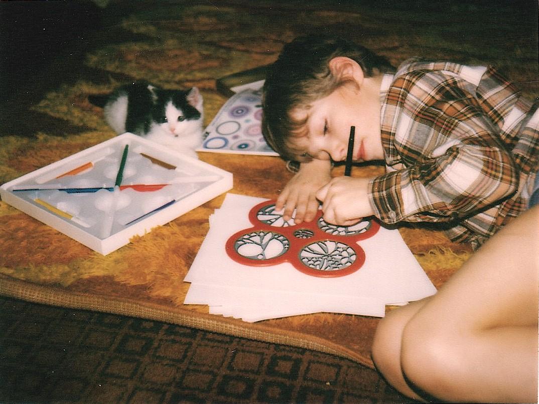 Duncan Fisher playing with his father's Cyclex toy